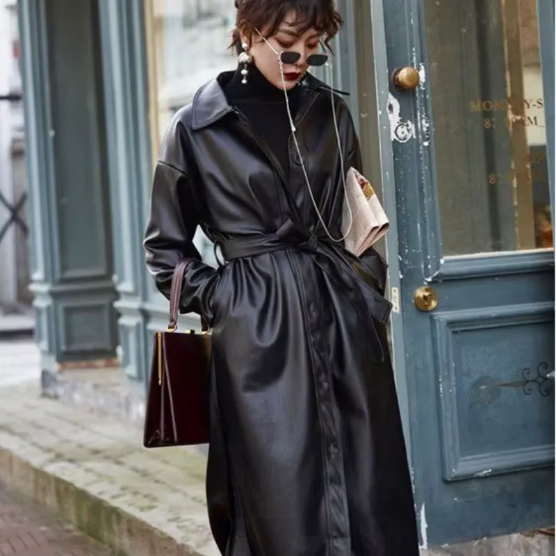 Bild 6 — Överdimensionerad PU-trenchcoat
